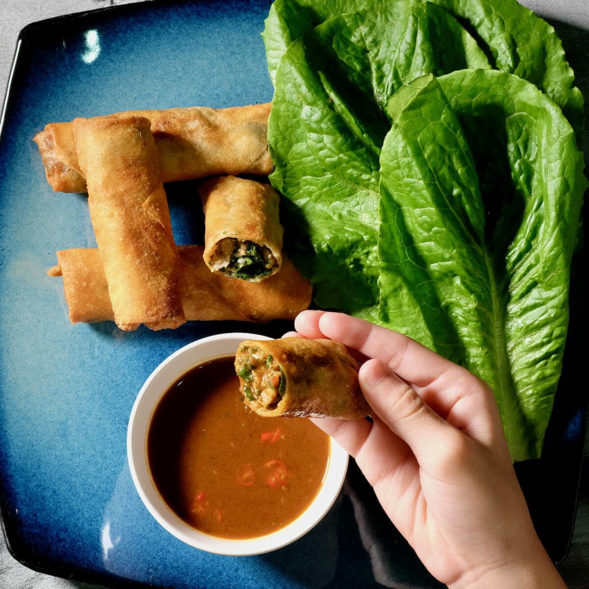 Duck and herb spring rolls. Very special dipping sauce. - delectabilia